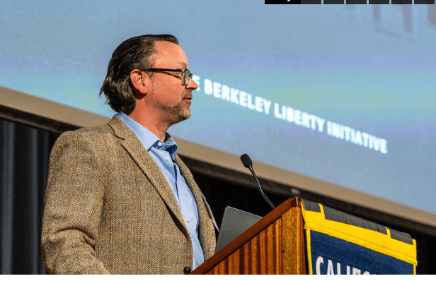 Speaker at Berkeley Liberty Initiative podium